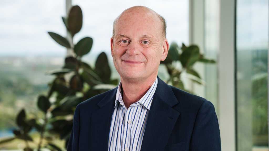 A photograph of BAI Communications' Peter Lambourne.