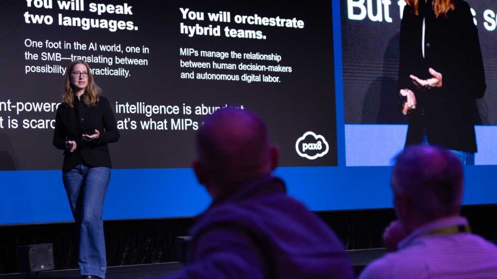 A photograph of Pax8's Libby McIlhany presenting at EDGE 2025.