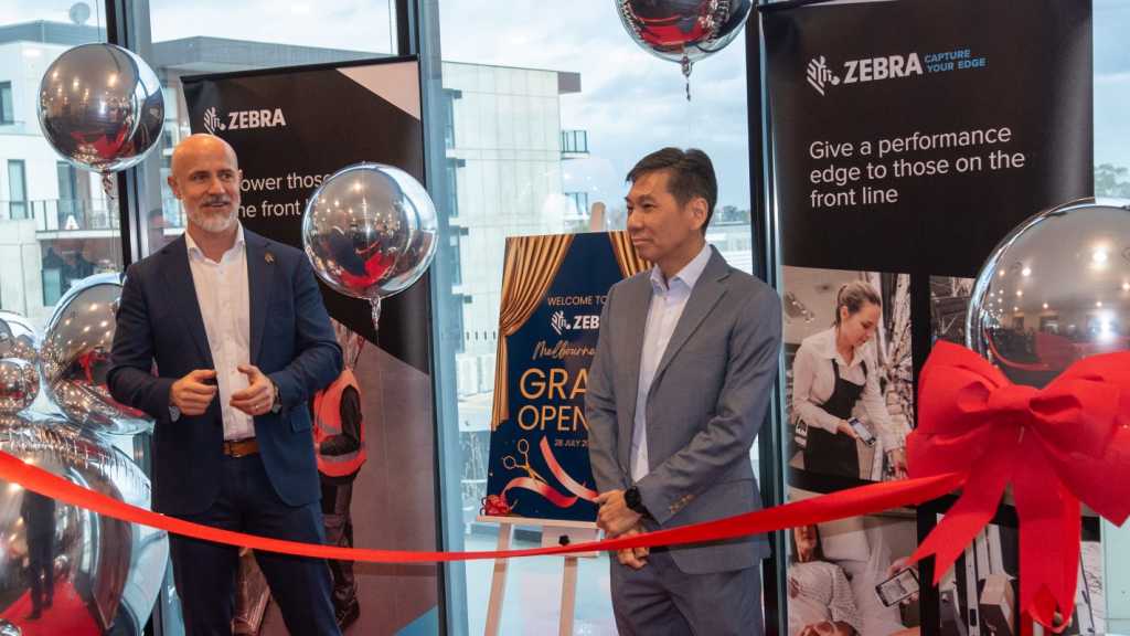 A photograph of, from left to right, Zebra Technologies' Tom Christodoulou and Ryan Goh.